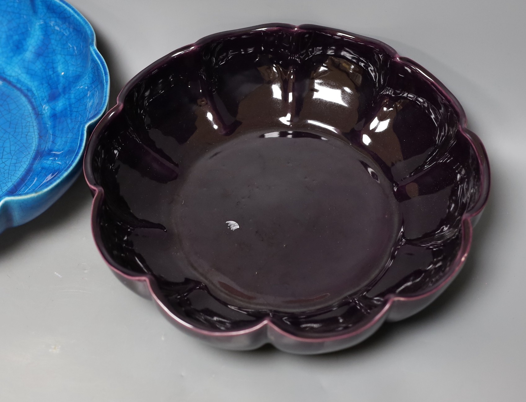 A Chinese blue crackle-glaze fluted bowl, together with another similar in purple. 28cm diameter